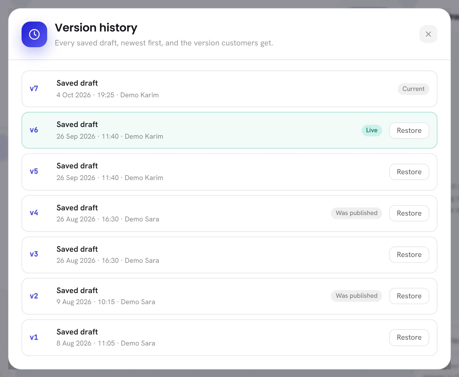 The Version history window: seven versions, the newest marked Current, an earlier one marked Live, and a Restore button on each earlier row.