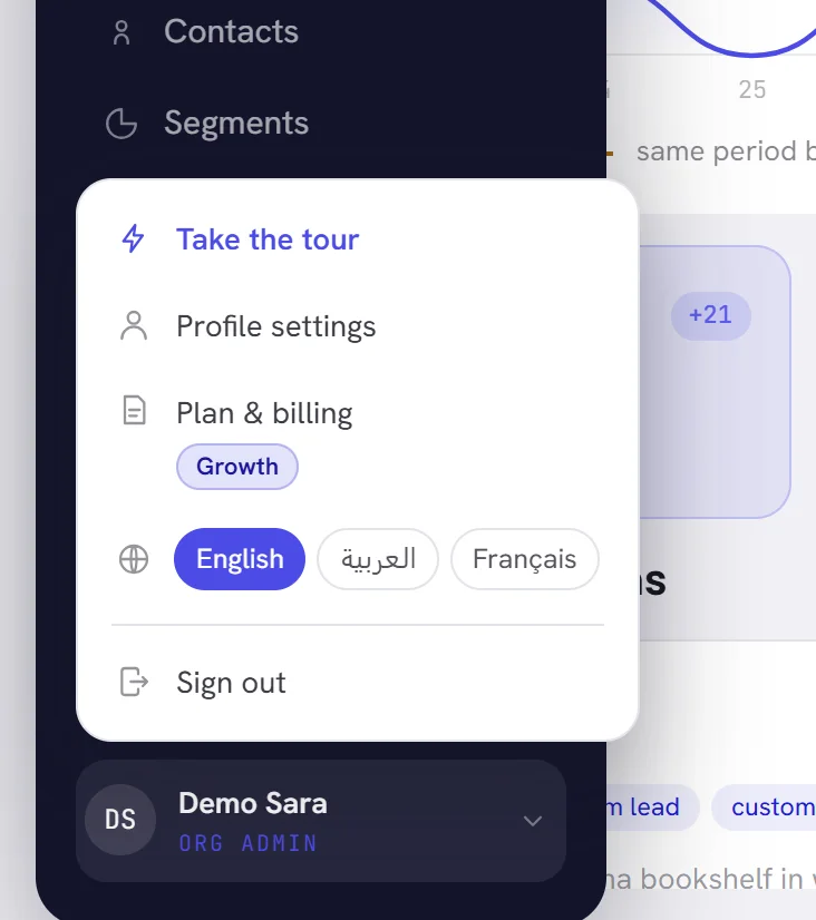 The account menu, open above the button with the person’s name and role: Take the tour, Profile settings, Plan and billing with the plan badge, the three languages, and Sign out.